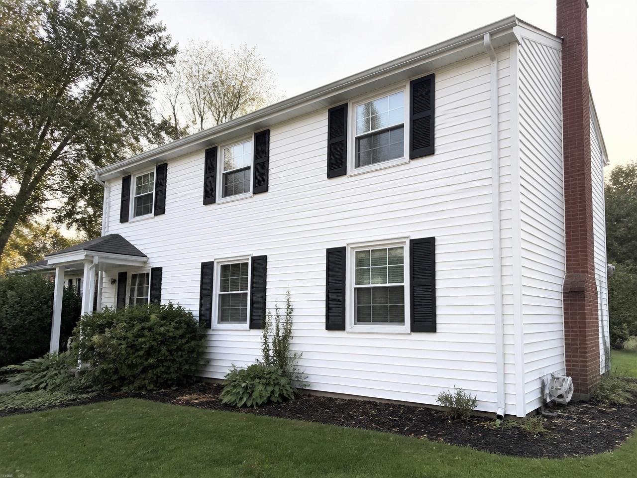 House siding before and after cleaning — after